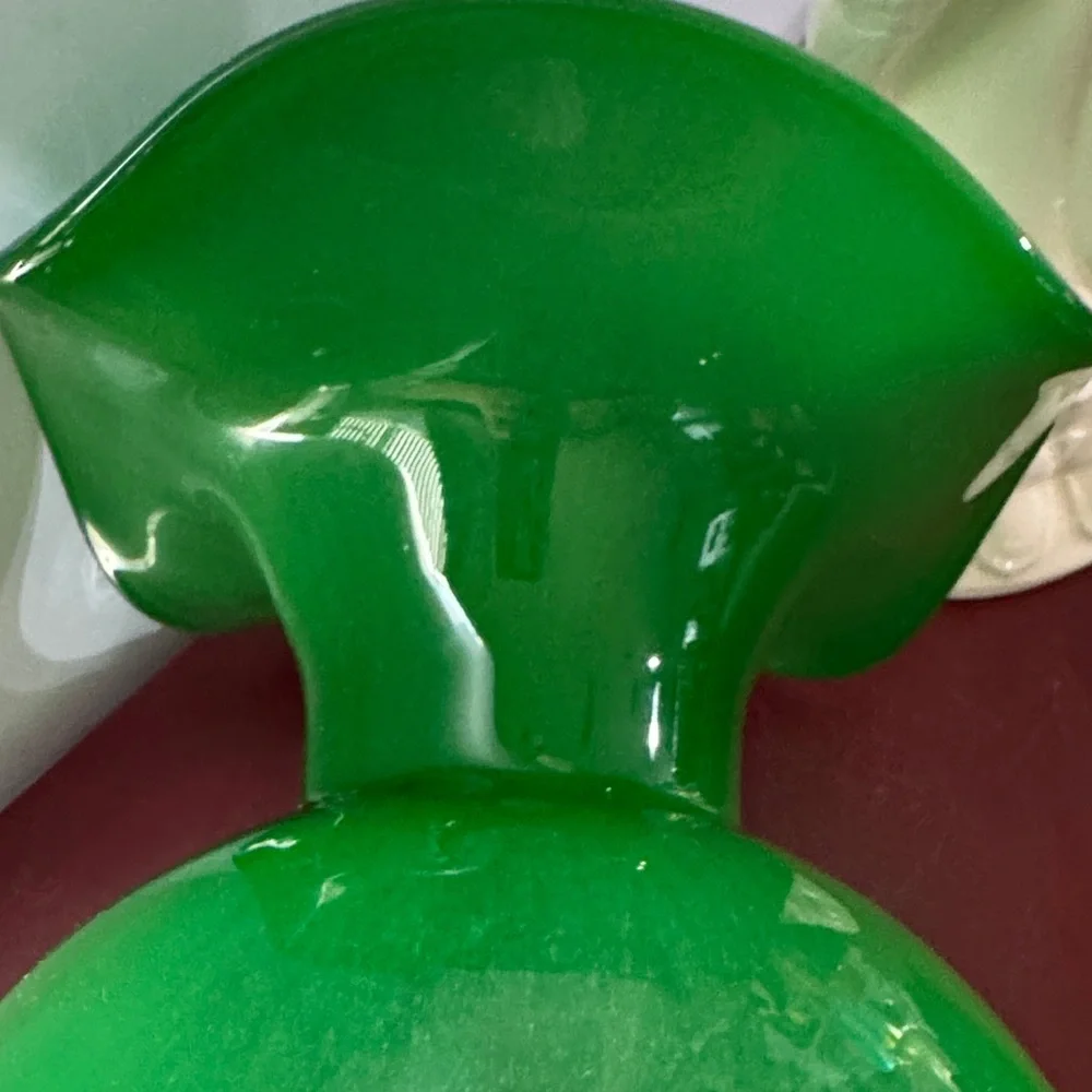 Elegant Hibiscus Fluted Vase in green glass.